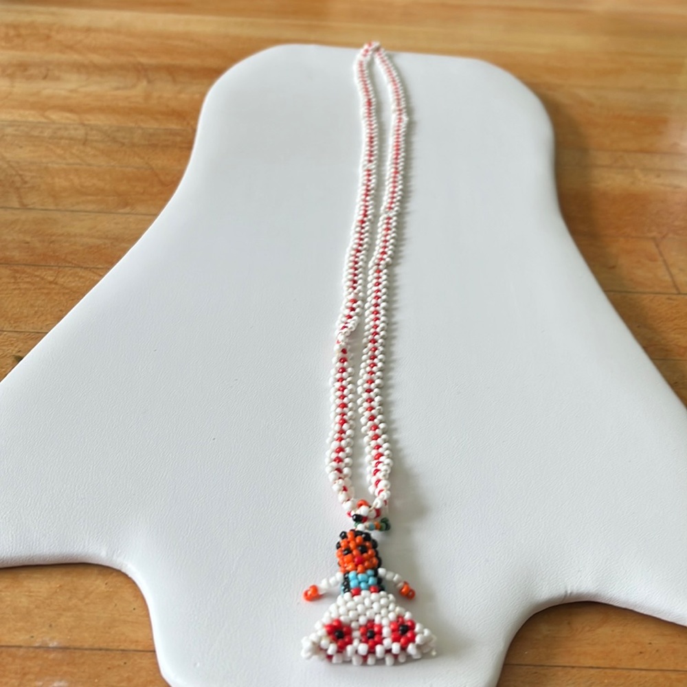 American Indigenous people doll necklace